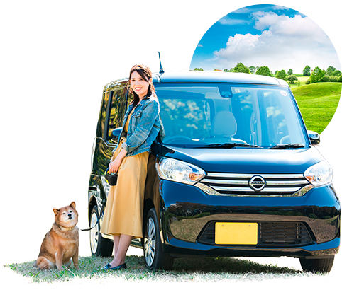 車と女性と犬
